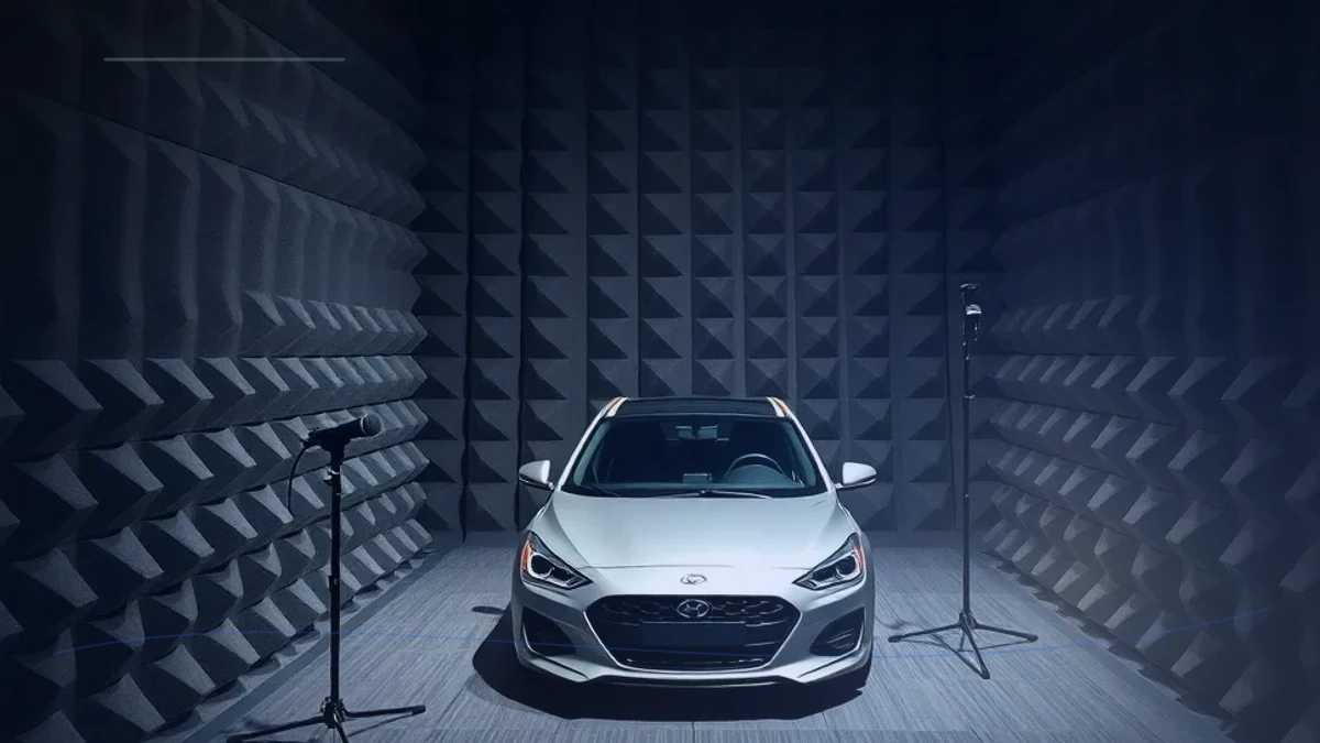 Semi-anechoic chamber with reflective floor for product noise testing
